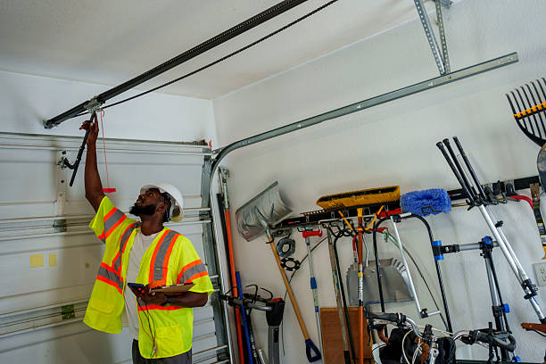 Professional Garage Door Panel Replacement technician working in Los Chaves, NM